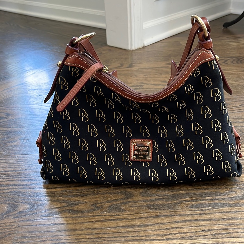 Dooney and Bourke Original design mid sized handbag